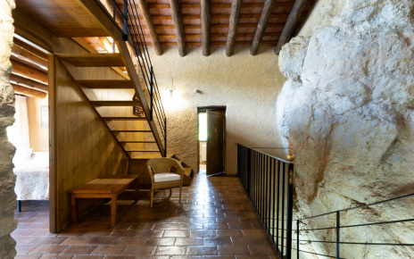 Stairs to upper floor with living area